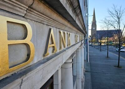 Gold leaf stone sign at the bank of Ireland in Lurgan by Joha Muñe