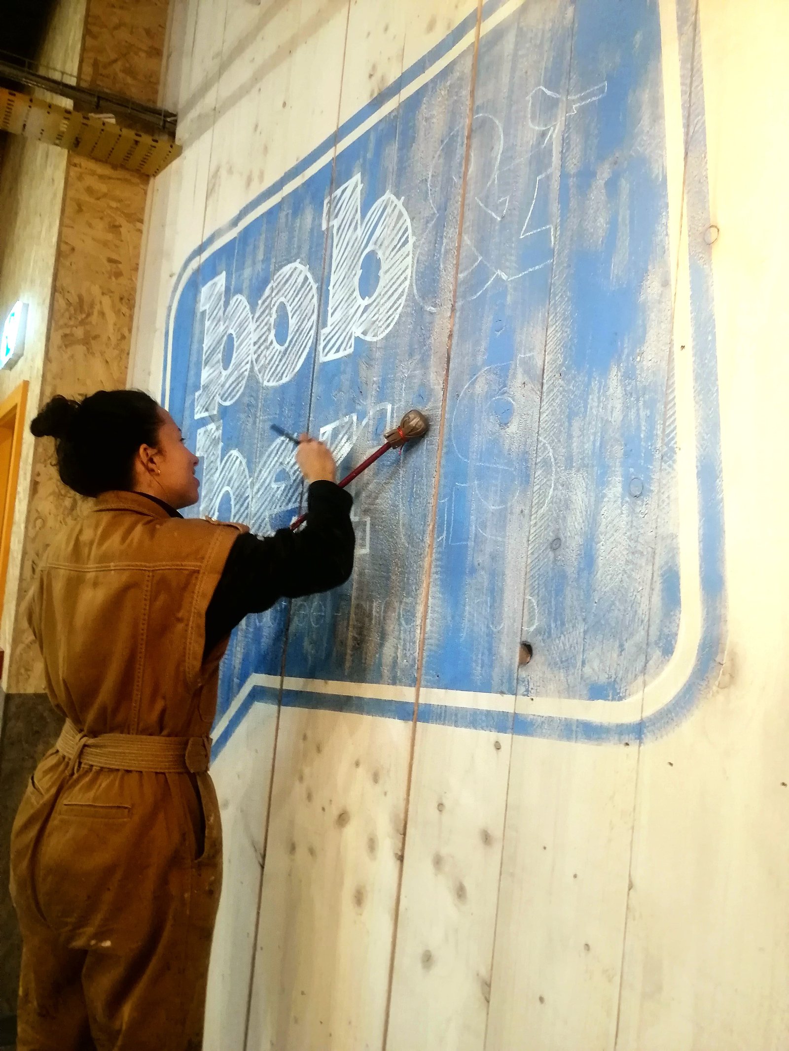 WhatsApp Image 2025-04-15 at 08.16.59 Hand-painted wall graphics for Bob & Berts Coffee Shop in Belfast, featuring distressed lettering and stamp-style logo art