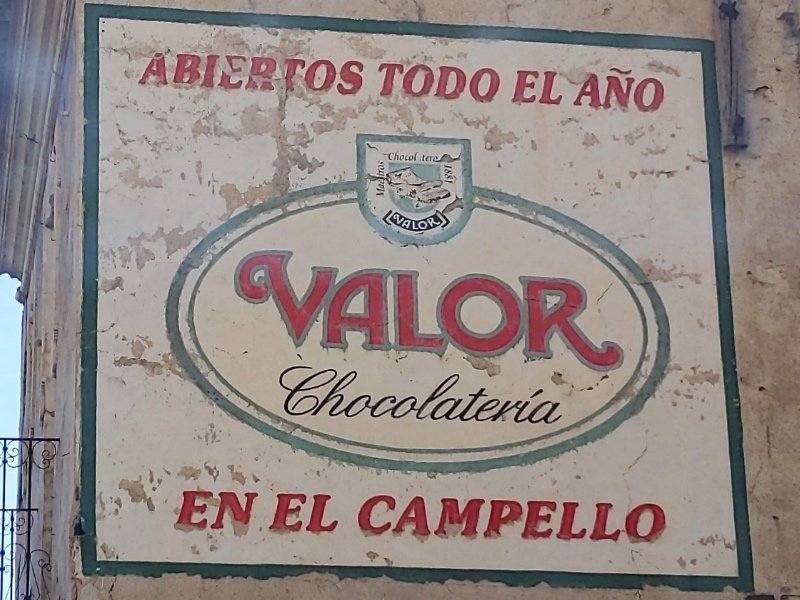 Example of how a hand painted sign ages. this is a signwriting on a wall in Spain